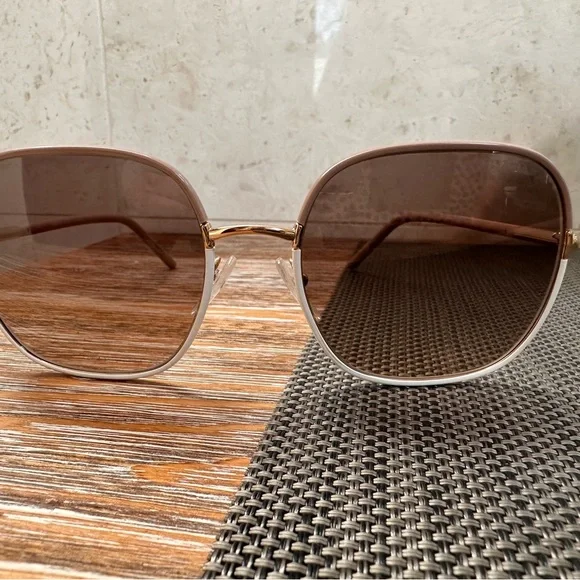 Prada women’s Sunglasses with white & tan frame. - Picture 5 of 7